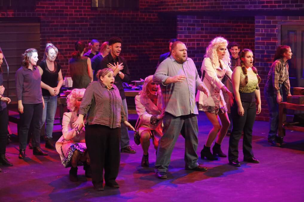 From left, front, Kara Sellars, Tim Stiles and Brittanie Shipway with other cast members in Kinky Boots. Picture: Craig Burgess, Family Fotographics