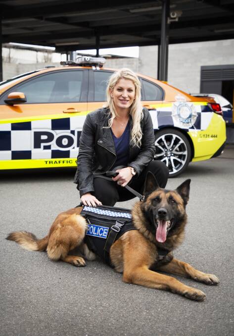 Constable Carla Duncan, mauled earlier this year by a pit bull terrier, has worked through a long, slow process in order to trust dogs again.