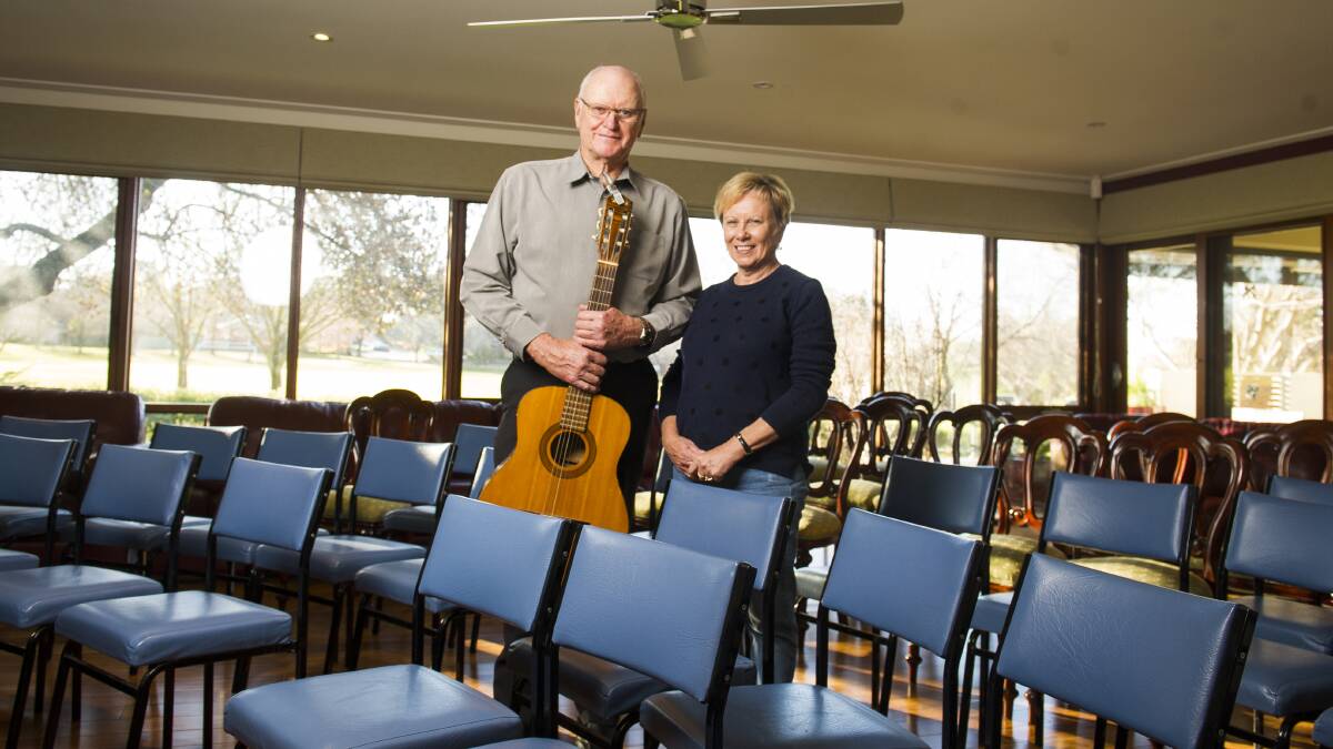 Bill McIntyre and Libby Hewson in their empty lounge/concert hall. Picture: Dion Georgopoulos