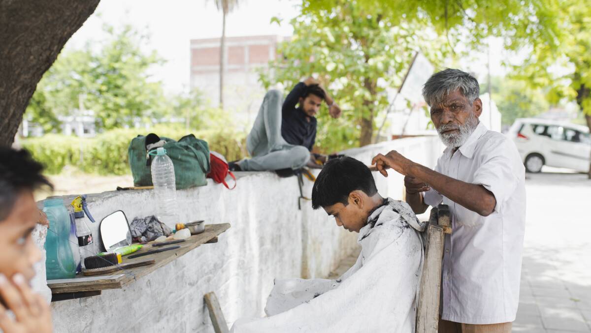 A haircut on the streets of Agra.
Picture: Jamila Toderas