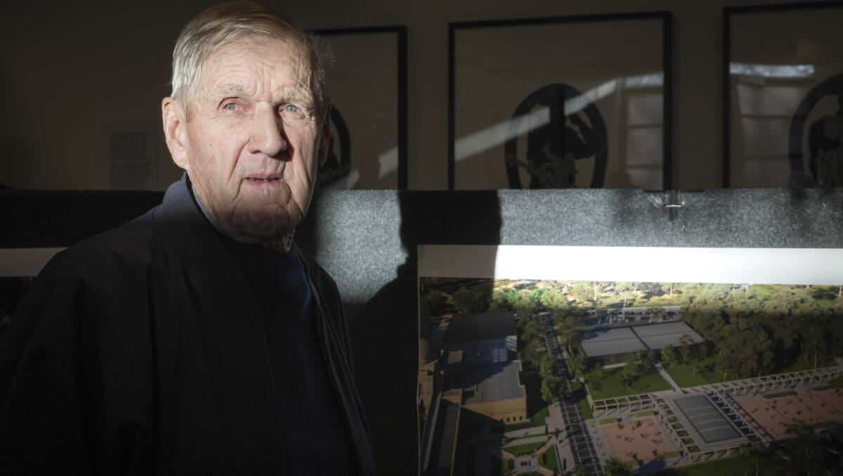 Campbell resident Keith Mitchell with an artist's rendering of the early works to be completed as part of the proposed Australian War Memorial expansion. Picture: Sitthixay Ditthavong