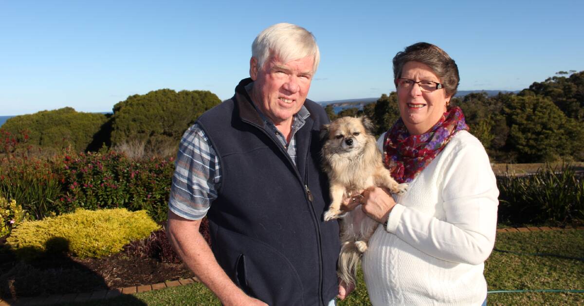 David and Lin Thorncraft, with their dog Suko, at their new home in Tura Beach. Picture: Denise Dion