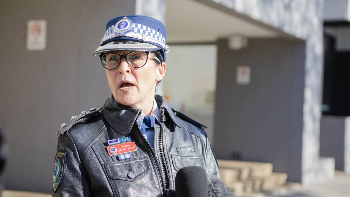 Queanbeyan police inspector Sandy Green addresses the media on Sunday after the Monaro Highway car crash that killed two people. Picture: Jamila Toderas