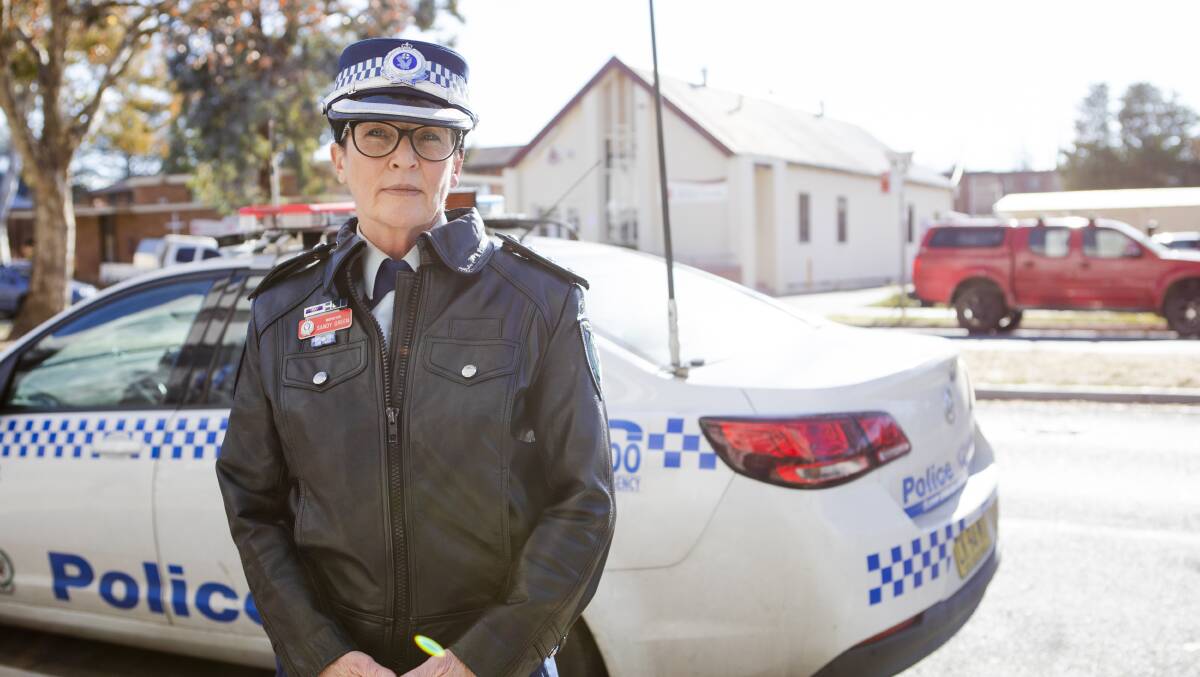 Queanbeyan police inspector Sandy Green said she was "mystified" that she still had to remind people passing the crash to slow down and wear seat belts. Picture: Jamila Toderas