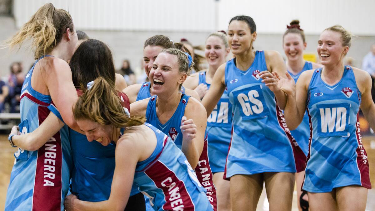 Canberra celebrate their division-one State League grand final win over Arawang. Picture: Jamila Toderas