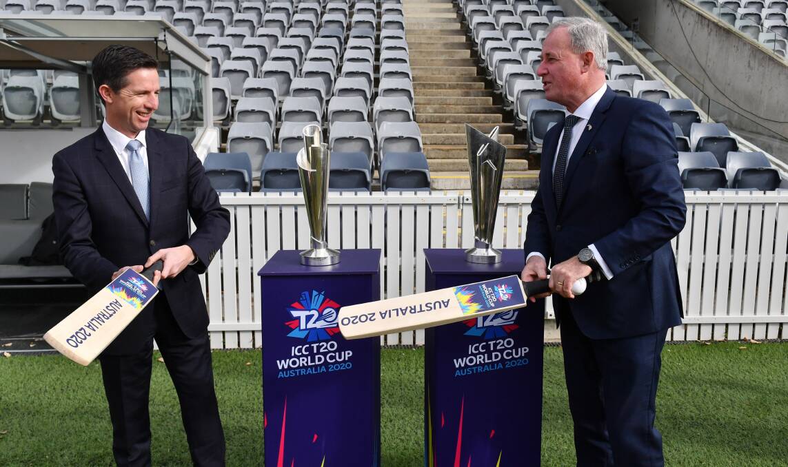Minister for Sport Richard Colbeck and Minister for Trade Simon Birmingham at a T20 Cricket World Cup announcement at Manuka Oval in Canberra. Picture: AAP