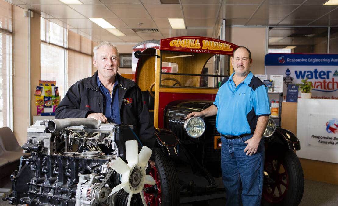 The owner of Cooma Diesel Service, David Webster (left) with Michael Burke, president of the ACT Motor Trades Association. Picture: Jamila Toderas
