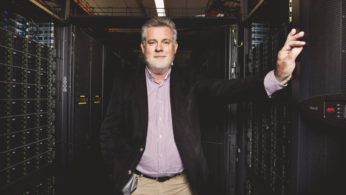 Director of NCI Professor Sean Smith with the new supercomputer at ANU. Picture: Jamila Toderas
