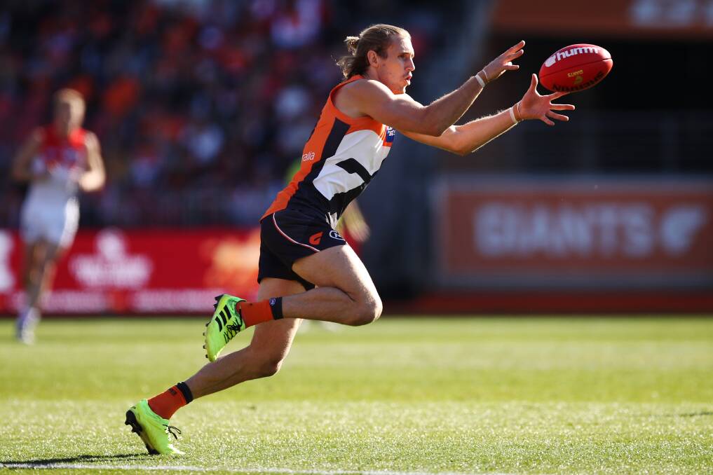 Nick Haynes of the Giants grabs a loose ball during the Round 20 AFL match between the GWS Giants and the Sydney Swans at the Sydney Showgrounds Stadium in Sydney, Saturday, August 3, 2019. (AAP Image/Brendon Thorne) NO ARCHIVING, EDITORIAL USE ONLY