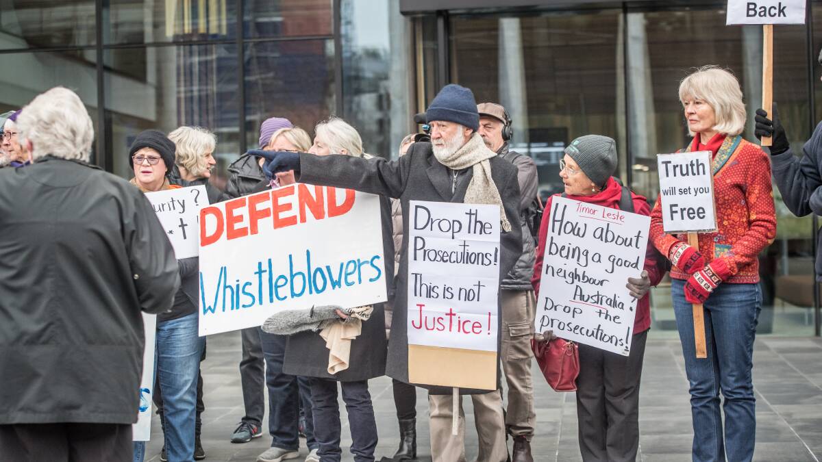 Protestors demonstrating in support of Witness K and Bernard Collaery at the Law courts of the ACT. Picture: Karleen Minney