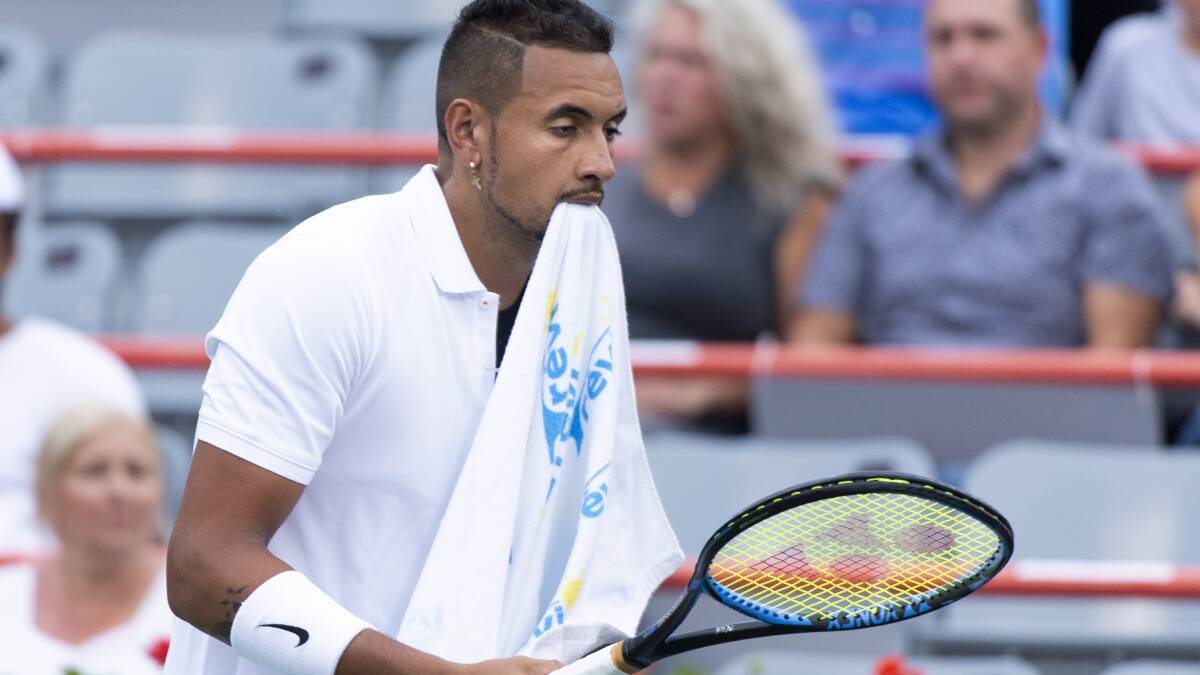 Nick Kyrgios appeared to spit in the direction of the chair umpire after losing his second round match at the Cincinnati Masters. Picture: AP