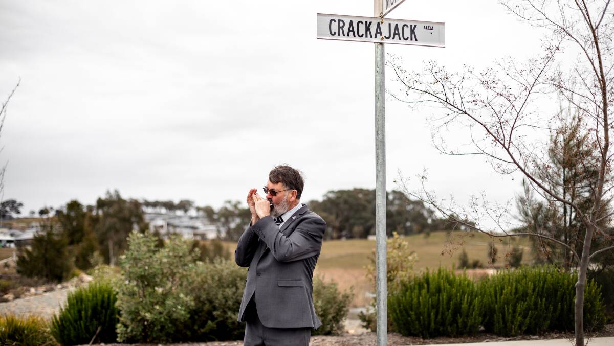 Surveyor-General of the ACT and co-chair of the ACT Place Names Committee Jeff Brown at Crackajack Street, one of his favourites. It's named after a brand of mouth organ. Picture: Ashley St George