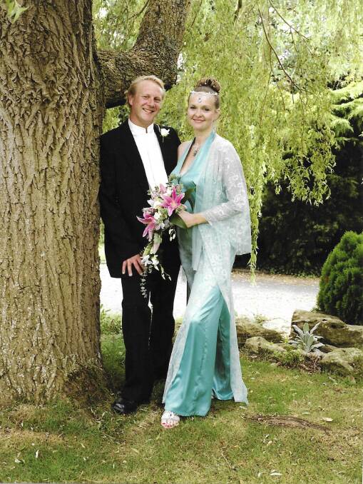 Greg and Liz Walton on their wedding day in 2005.