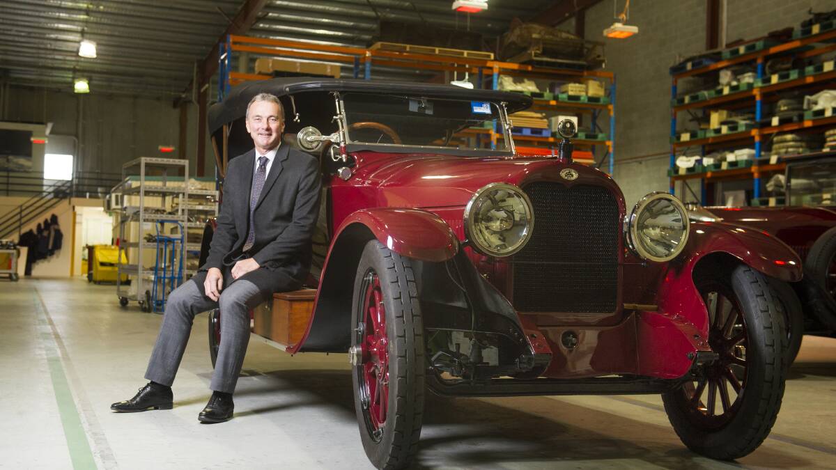 National Museum of Australia director, Dr Mathew Trinca, with one of his favourite historical cars an Australian Six which will take to the track at Wakefield Park. Picture: Dion Georgopoulos