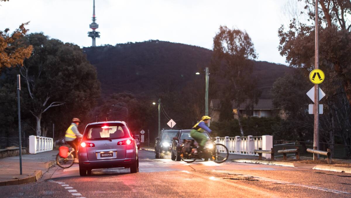 Cyclists using the busy pedestrian crossing on David Street, Turner on Friday afternoon. Picture: Elesa Kurtz