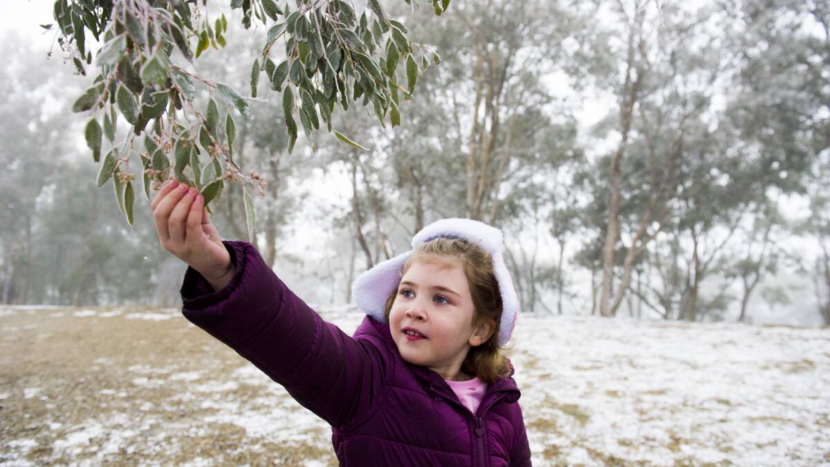 Snow remained at Mount Stromlo, Black Mountain and Mount Ainslie early Saturday morning. 