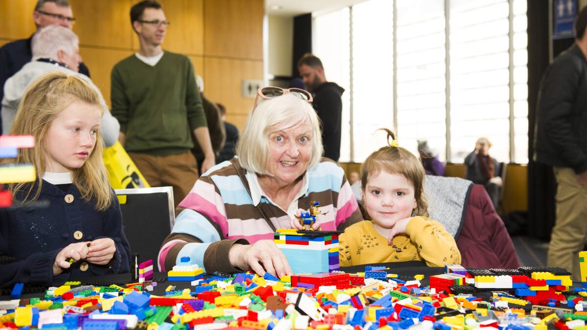 Nola Rogusz and her granddaughter Finley, 3, play with Lego at the Brick Expo in Woden. Picture: Dion Georgopoulos