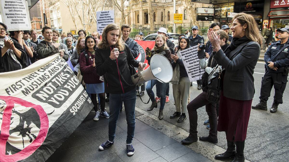 Protesters are confronted by the event's supporters outside the CPAC conference. Picture: Steven Siewert