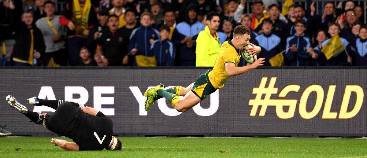 Nic White dives over to score in the second half. Picture: AAP