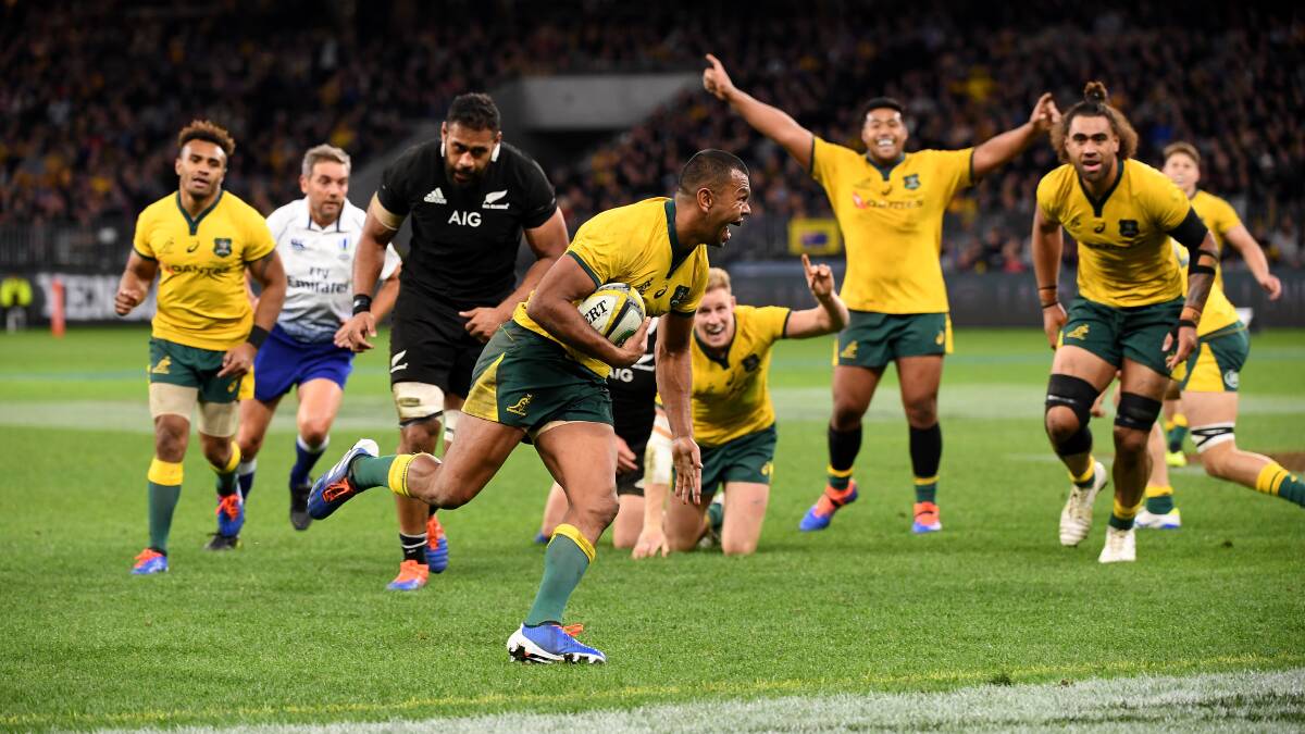 Kurtley Beale of the Wallabies scores a try during the Bledisloe Cup in Perth on Saturday night. Picture: AAP