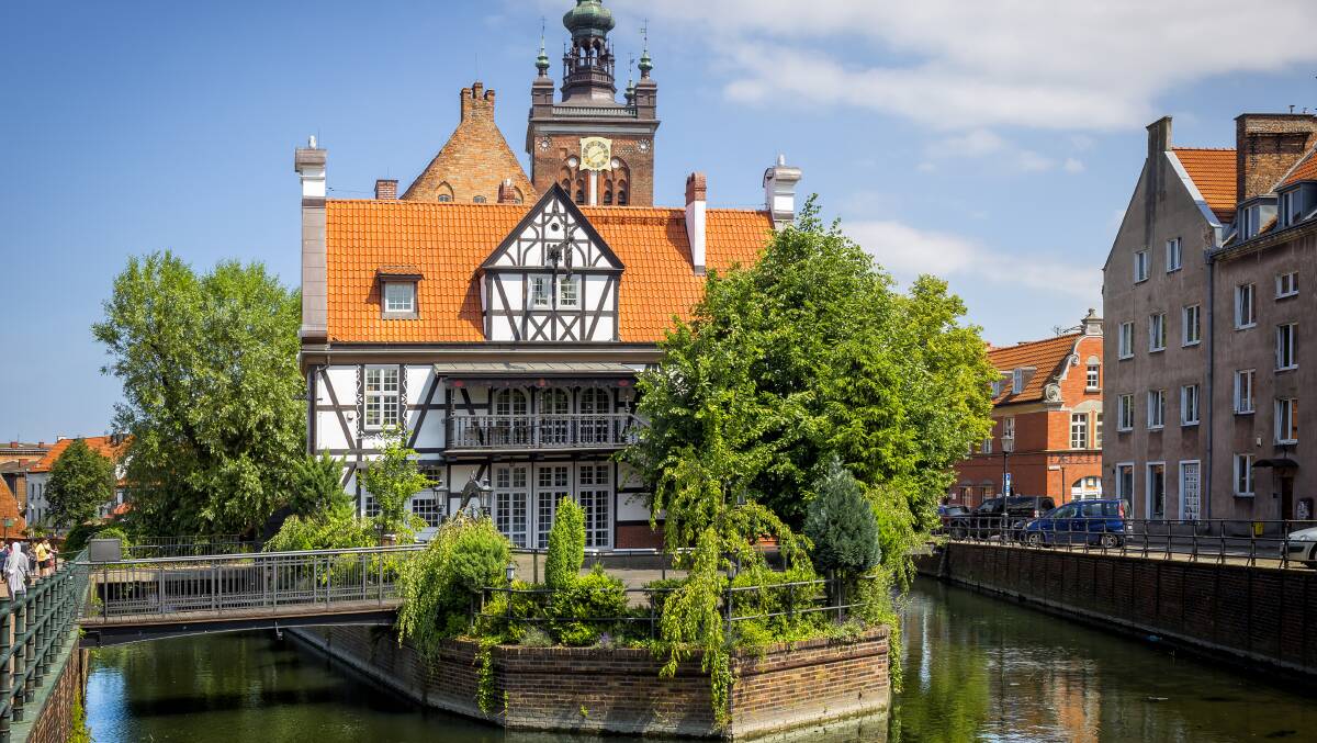 The Raduni canal and Hanseatic-style tenement houses in the Old Town of port city Gdansk.