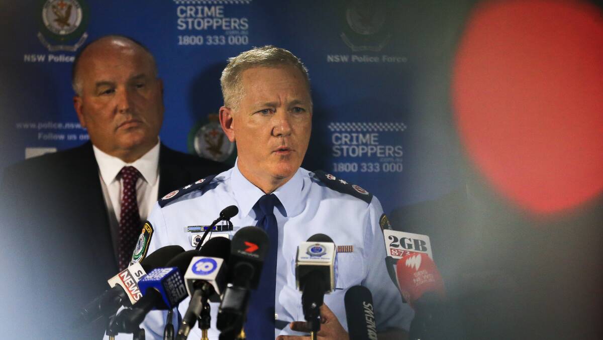 NSW Police Commissioner Mick Fuller speaks to the media alongside NSW Minister for Police and Emergency Services David Elliott (left). Picture: AAP