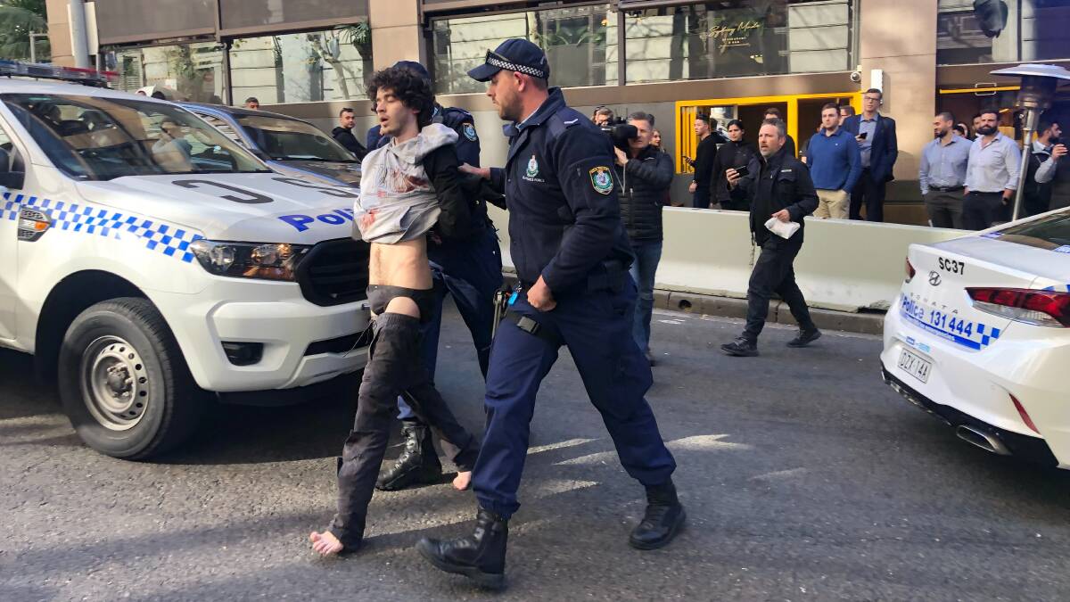 Mert Ney is arrested after being detained by the public on Tuesday. Picture: AAP