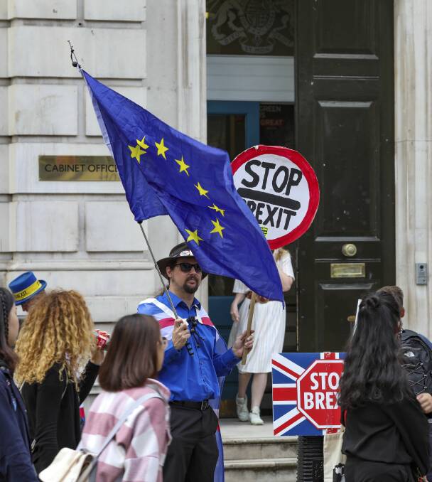 Anti-Brexit protesters demonstrate outside the Cabinet Office in Whitehall in London. Picture: Vudi Xhymshiti (AP)