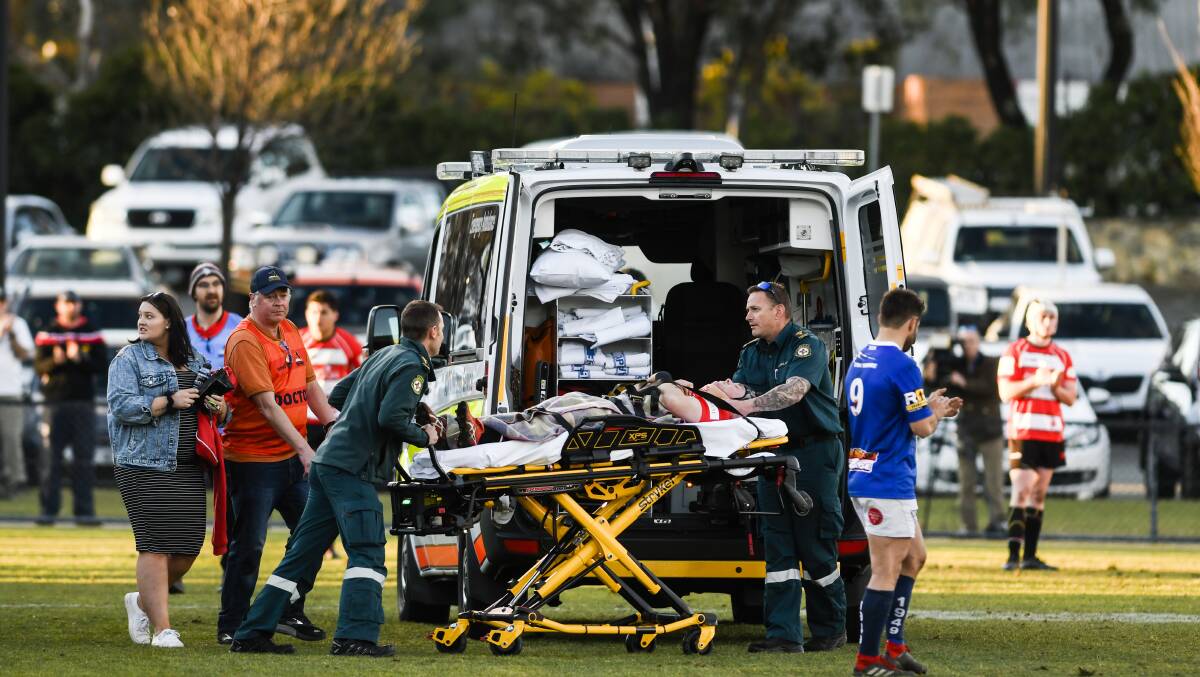Billy Carberry was taken away in an ambulance after being injured. Picture: Dion Georgopoulos