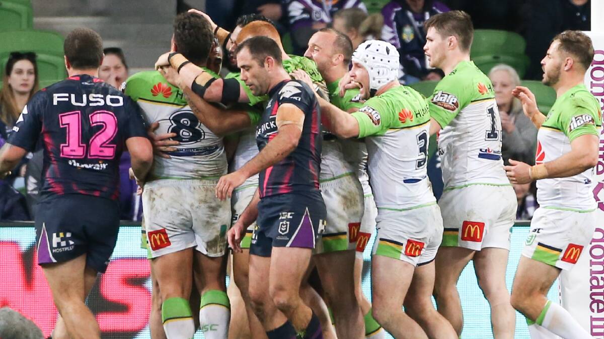 Raiders players celebrate Josh Papalii's winning try. Picture: NRL Photos
