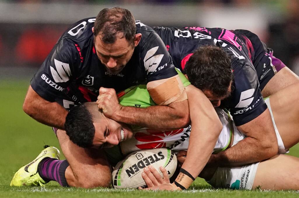 Cameron Smith of the Storm tackles Bailey Simonsson last weekend. Picture: AAP