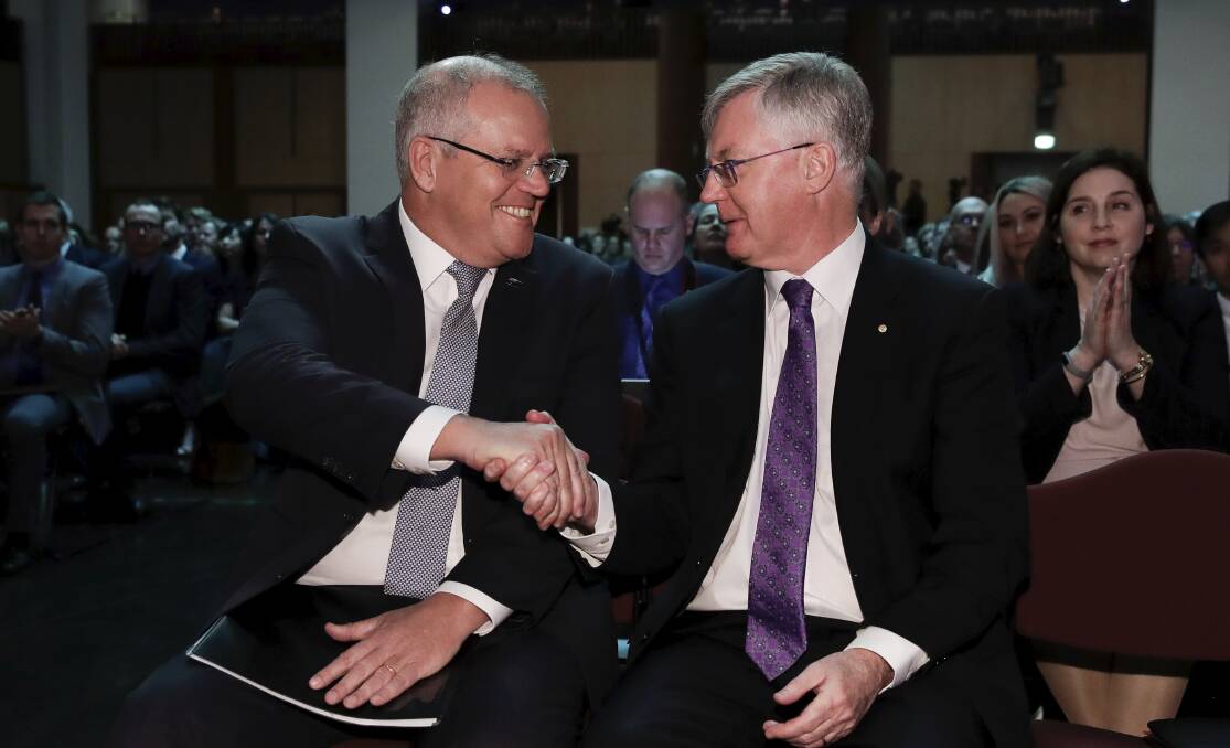 Prime Minister Scott Morrison sits with Department of the Prime Minister and Cabinet secretary Martin Parkinson after giving his speech to public servants at Parliament House on Monday. Photo: Alex Ellinghausen.