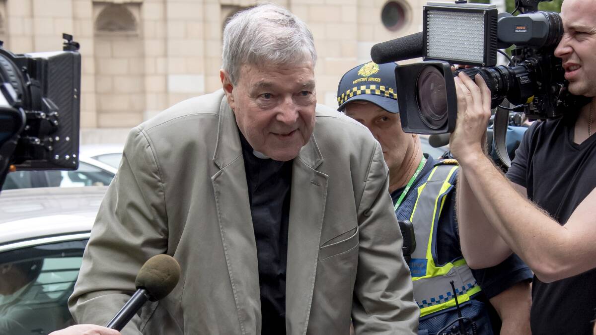Cardinal George Pell leaves the County Court in Melbourne on February 26. Picture: AP