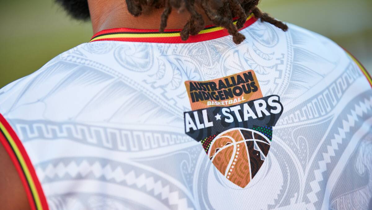 Patty Mills models the new Australian Indigenous Basketball All Stars jerse...