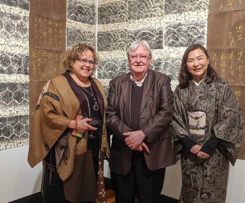 Carol Hayes of Conder, Drill Hall Gallery director Terence Maloon of Acton and tanka poet Noriko Tanaka of Japan. 