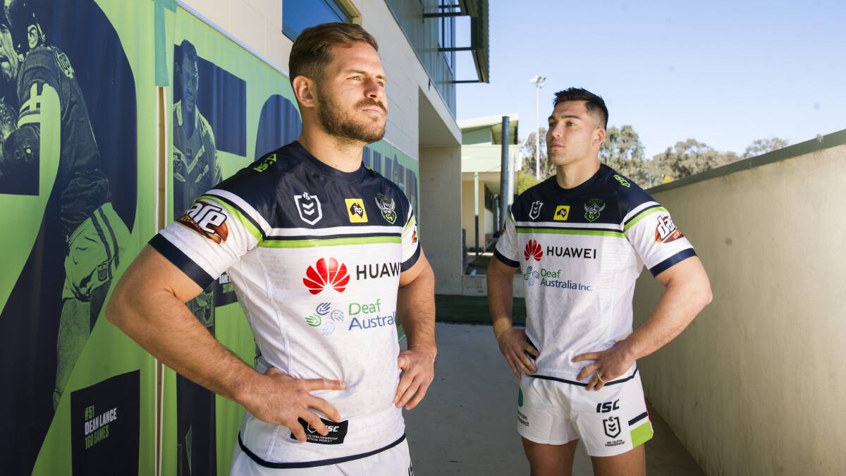 Aidan Sezer and Nick Cotric in the Raiders' Deaf Australia charity jersey. Picture: Dion Georgopoulos