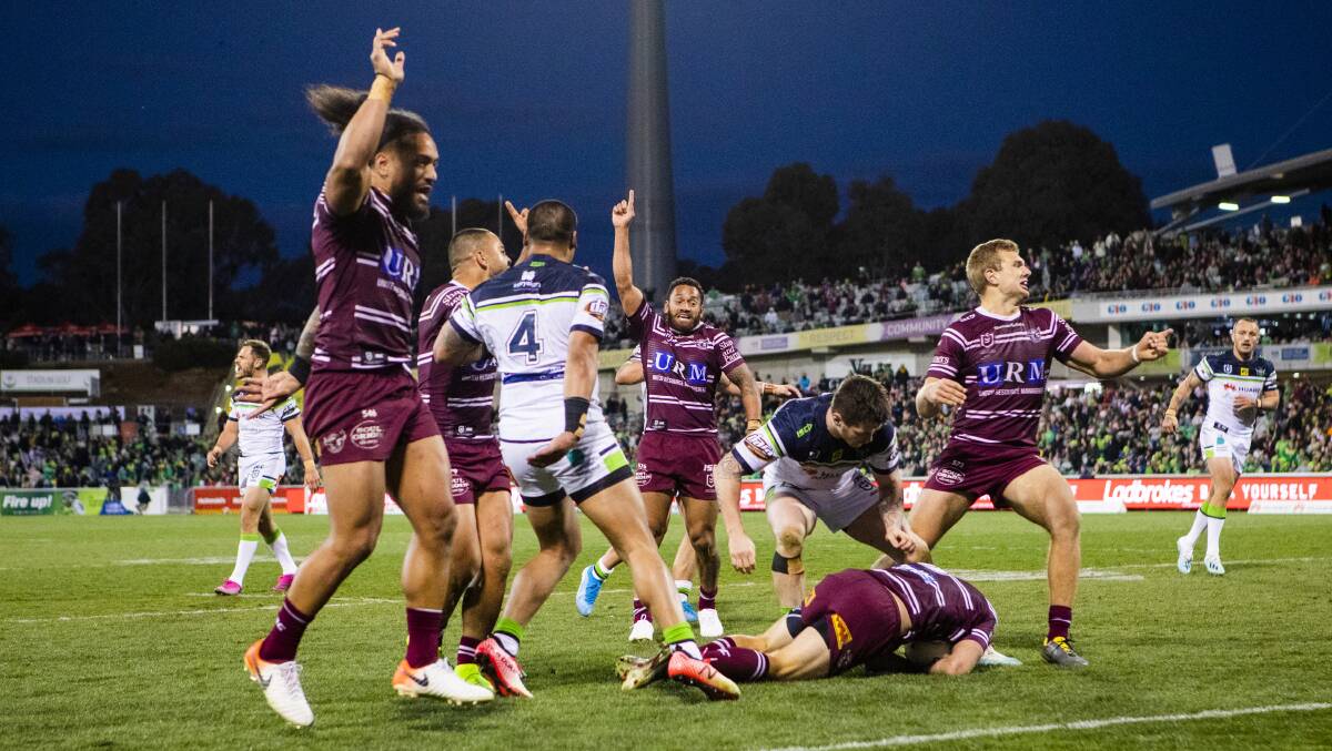 Brendan Elliot leaps on a ball to win the game for Manly Sea Eagles. Picture: Jamila Toderas