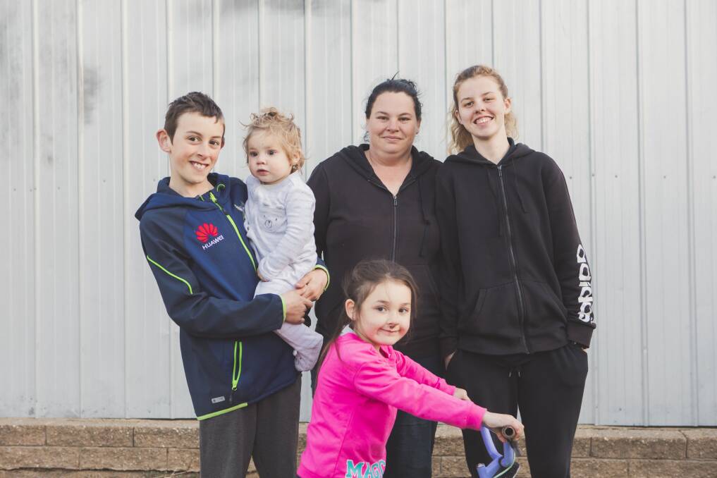 Julie Marshall with her children Sebastion, 11, Adelaide, 1, Terri, 6, and Tiffany, 15. Tiffany and Sebastion sat NAPLAN online this year, and found it easier and quicker than pen and paper exams. Picture: Jamila Toderas