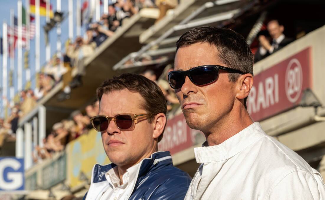 Christian Bale, right, and Matt Damon in a scene from Ford v. Ferrari.
