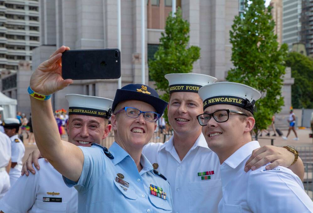 Air Vice Marshal Tracy Smart, AM, takes a selfie with sailors from the Royal Australian Navy prior to this year's Mardi Gras parade. Picture: ADF