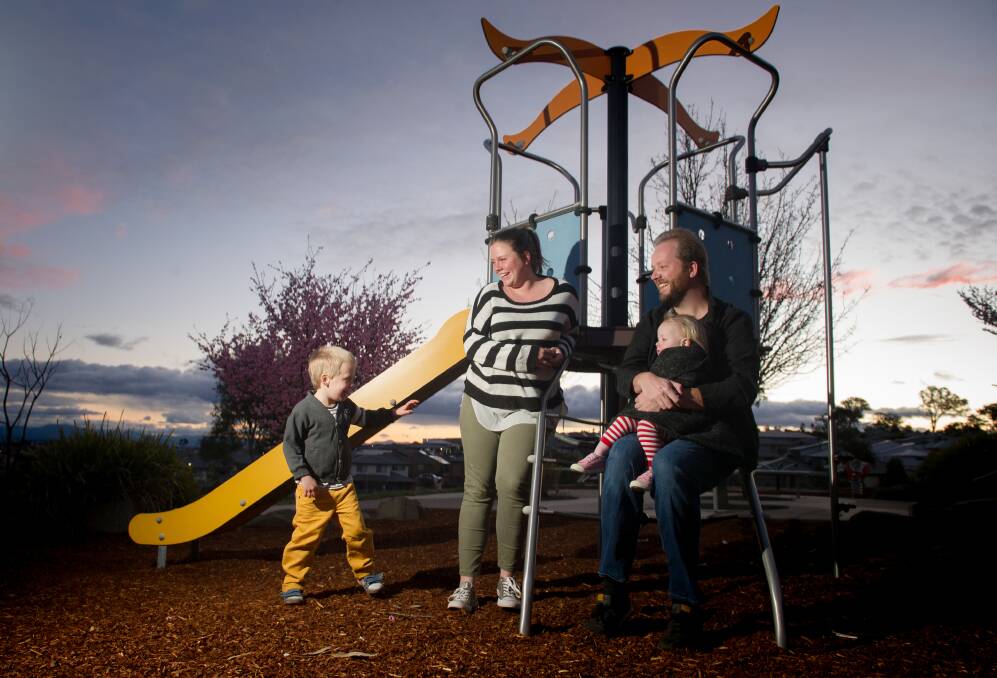 Amelia and Joe Darmody, with their children, Lachlan, 3, and Sarah, 18 months, are residents of Bonner, which has one of the highest concentrations of children in Australia. Picture: Elesa Kurtz