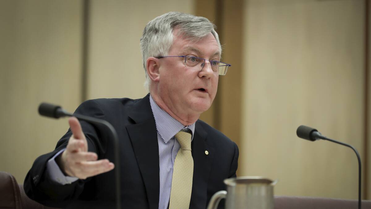 Former secretary of the Department of Prime Minister and Cabinet Martin Parkinson giving evidence at Parliament House in Canberra in August. Photo: Alex Ellinghausen