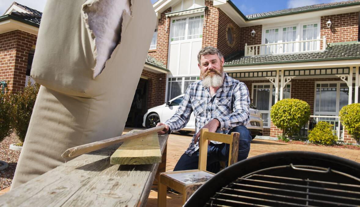 Steve Tattam, pictured at his Kambah home with bulky waste, has welcomed the scheme. Picture: Dion Georgopoulos