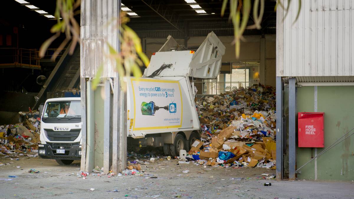 Waste at the Materials Recovery Facility in Hume, where material from the ACT's recycling bins is processed. Picture: Elesa Kurtz
