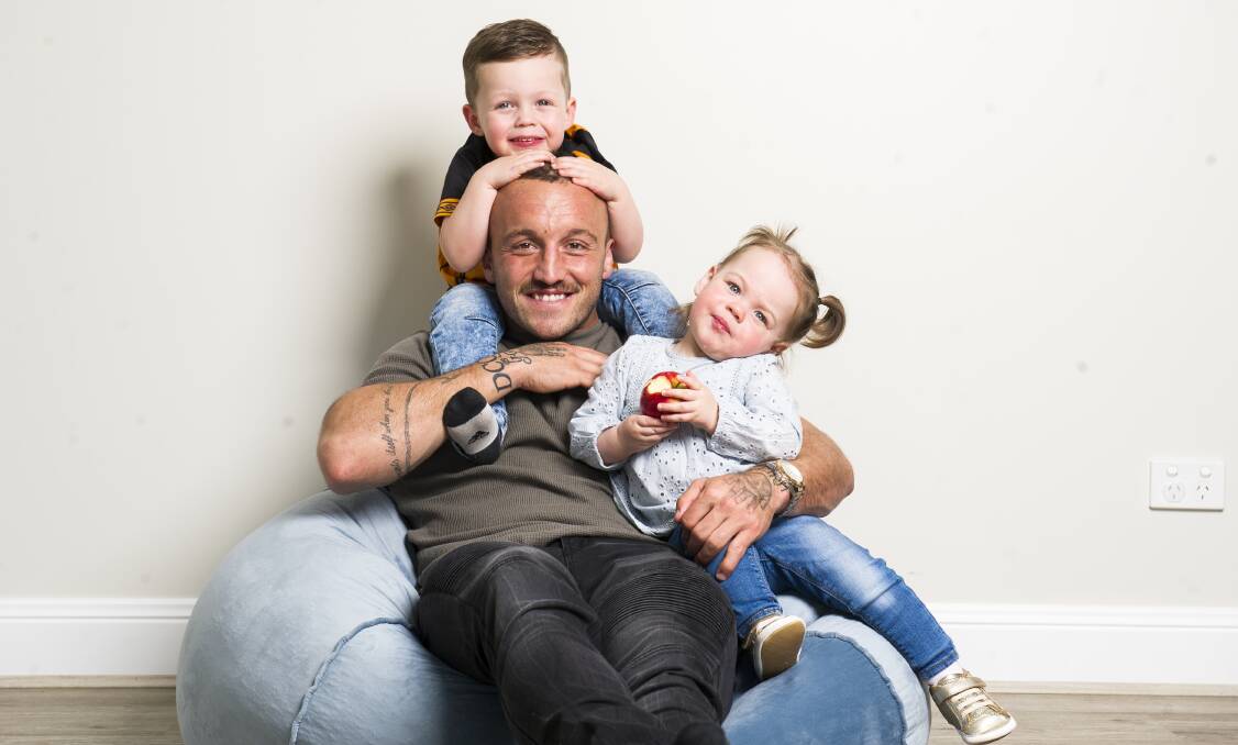 Raiders co-captain Josh Hodgson with his kids George, 3, and Ivy, 1. Picture: Dion Georgopoulos