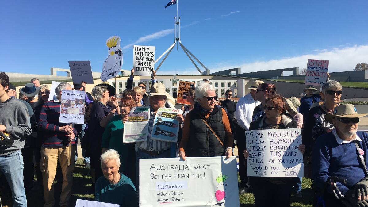 Hundreds gathered outside Parliament House to protest the deportation of a Tamil asylum seeker family.