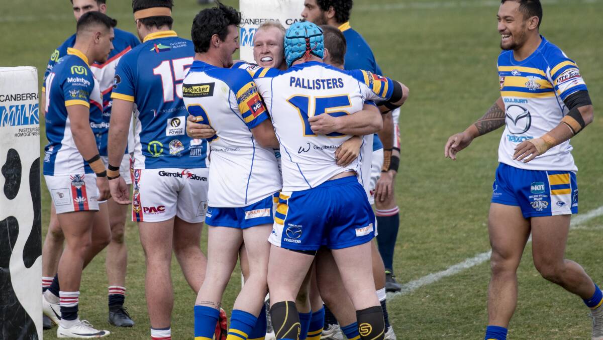 Nicholas Cornish reacts with Bulldogs teammates after scoring a try. Picture: Sitthixay Ditthavong