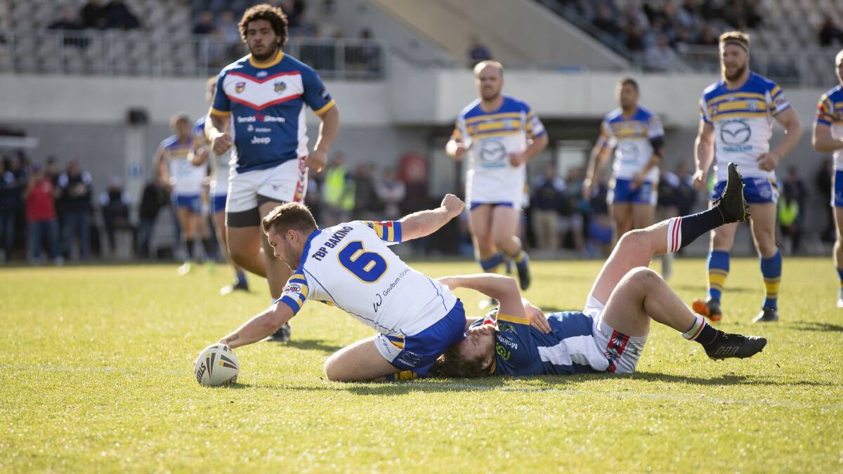 The Bulldogs' Mitchell Cornish charges over for a try. Picture: Sitthixay Ditthavong