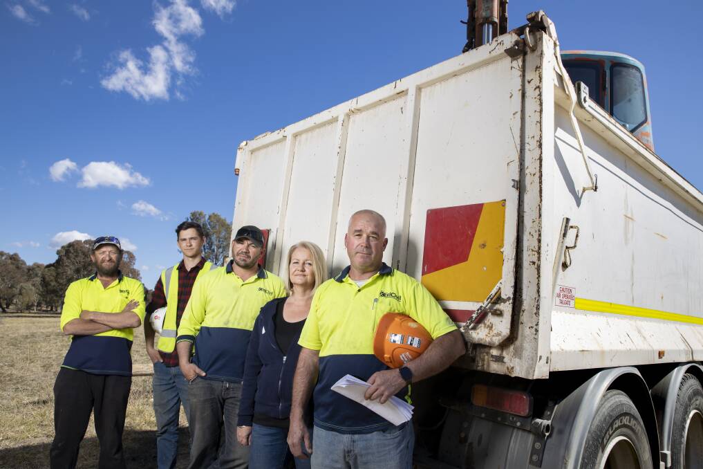 Xcel Civil employees Kevin Inglis, Mitchell Cameron, Frank Cervo, and owners Jess and Aaron Agnew. The couple's company has seen work dry up amid lengthy delays in the assessment of major projects. Picture: Sitthixay Ditthavong
