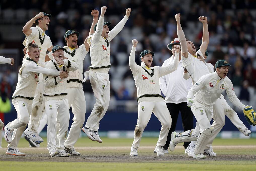 Australia celebrates after claiming the final wicket to claim victory and retain the Ashes during. Picture: Getty Images. 